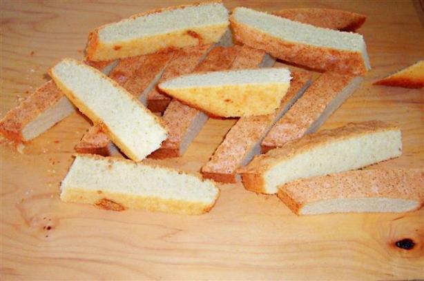 Buttered baking pan for homemade biscotti by bakethiscake